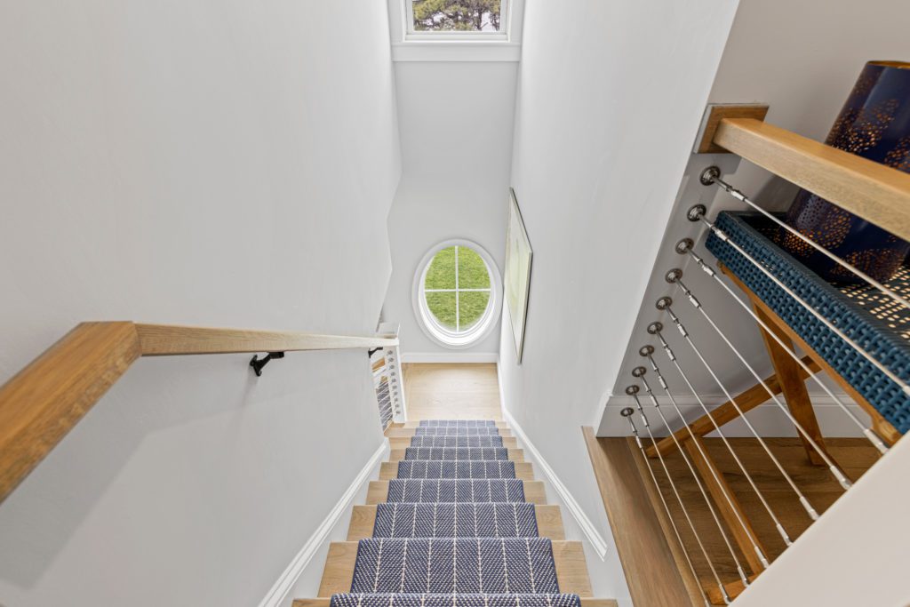 stairway and oval window